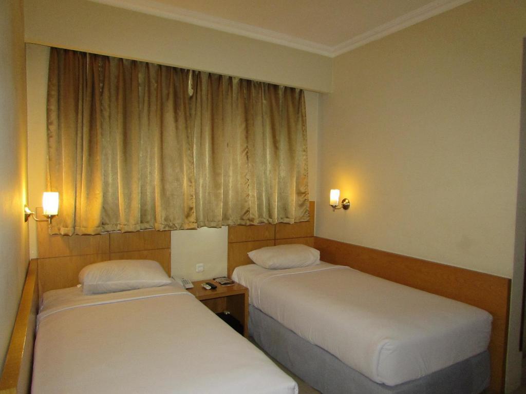 Hotel Wisata Palembang Rum bild